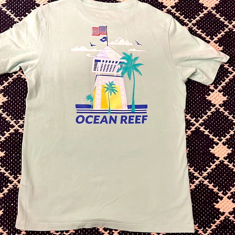 Vineyard Vines teal shirts fromOcean Reef.